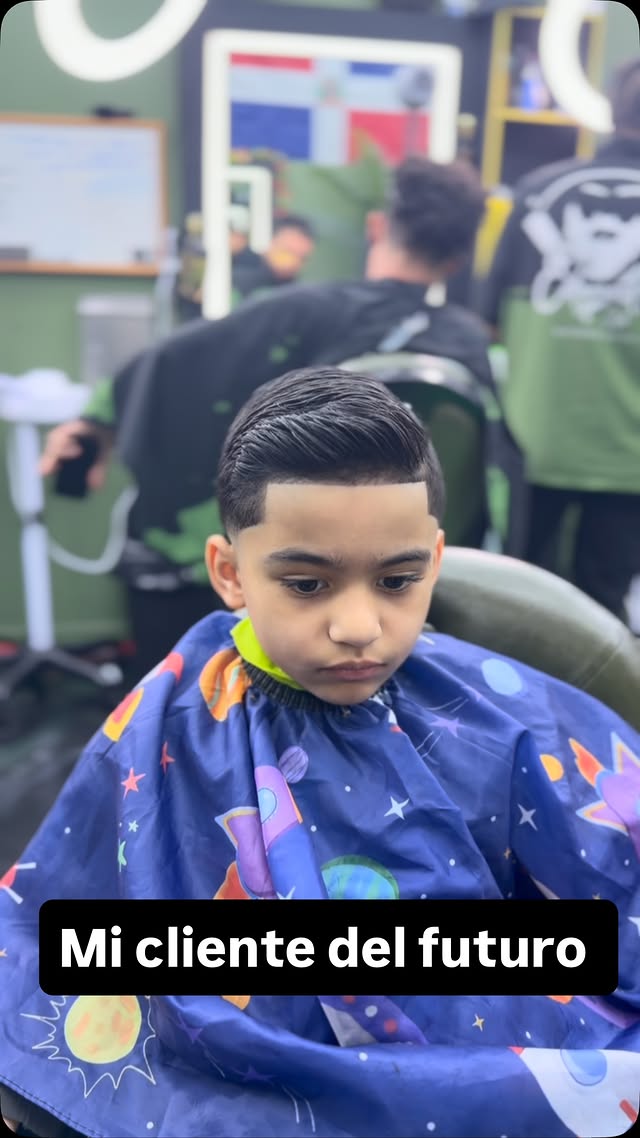 Kid getting a fresh haircut at Edward Style Barbershop