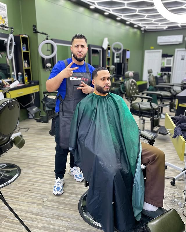 Barber posing with client after a fresh cut at Edward Style Barbershop